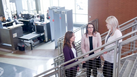 NC State psychology professor Sarah Desmarais, left, recent graduate Evan Lowder and alumna Sara Warren talk inside the Wake County Detention Center in Raleigh. 