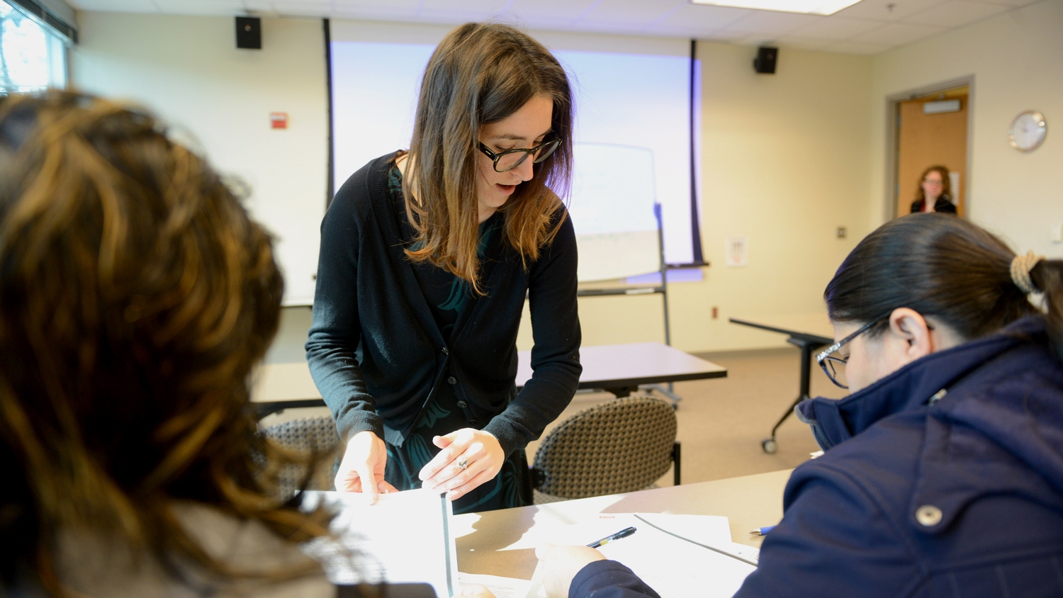 Cecilia Tomasatti explaining instructions to students