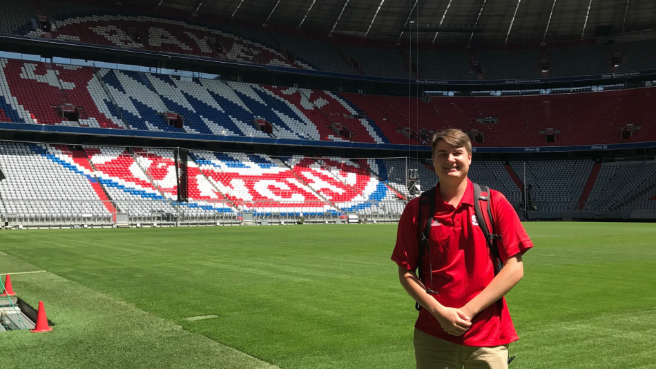 student standing inside Allianz Arena, home of FC Bayern Munich