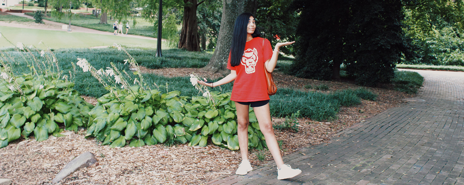 Student standing on Court of North Carolina