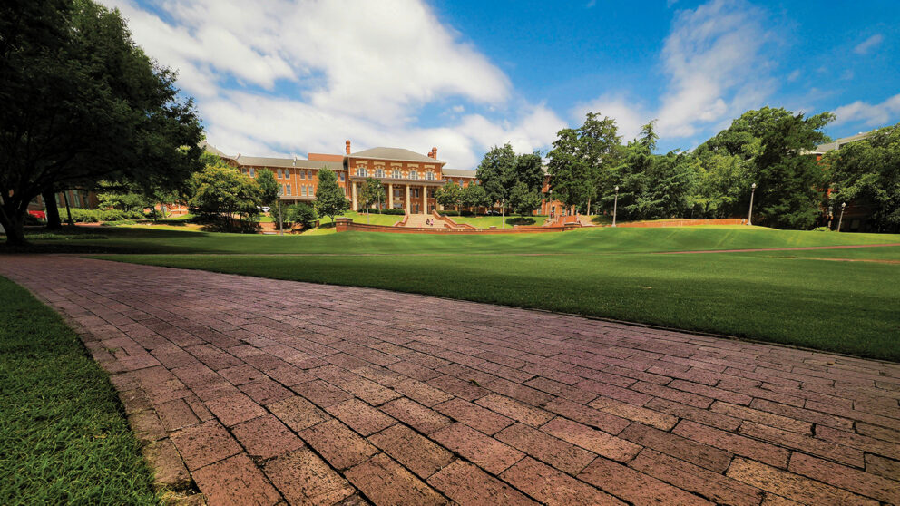 A view of NC State's 1911 Building from across the Court of North Carolina.