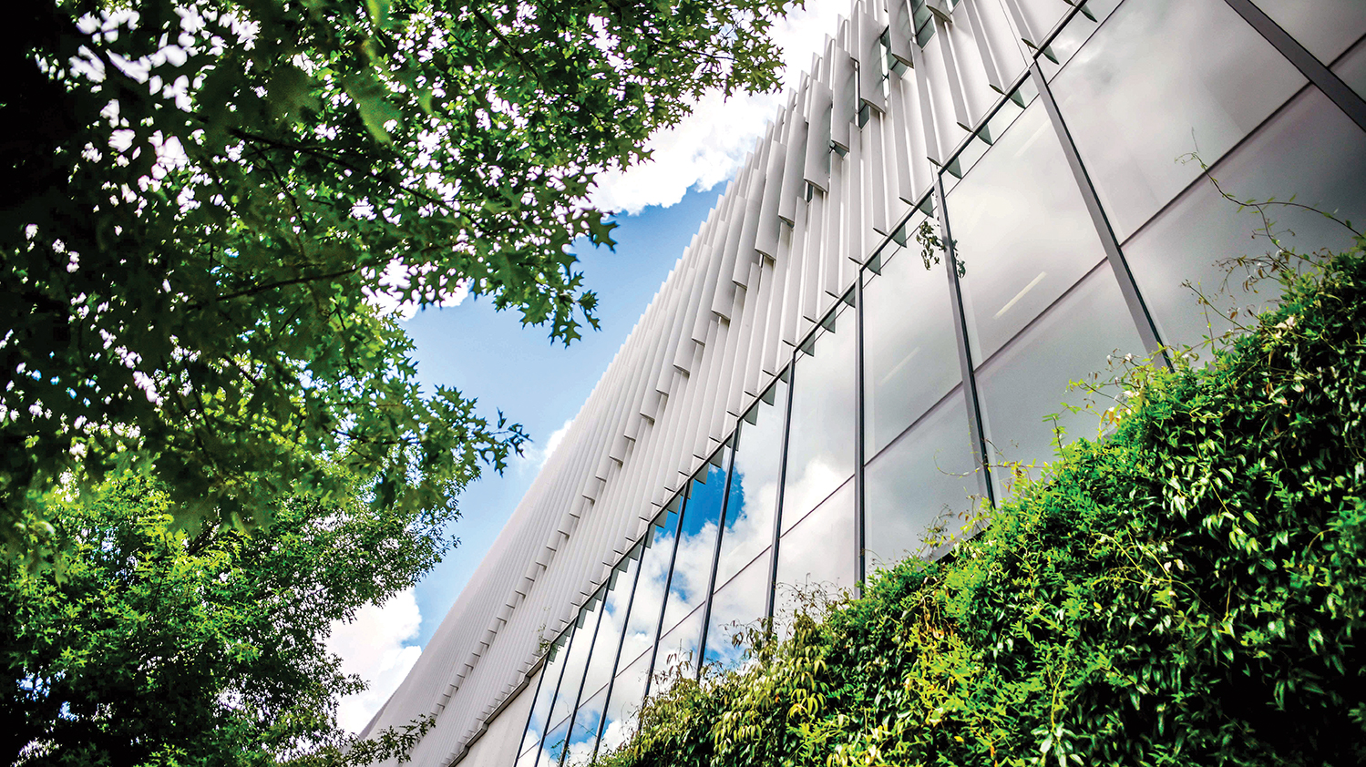 A view from below of Hunt Library on a sunny day.